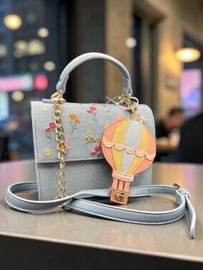 Betsey Johnson Light Blue Floral Crossbody with Pastel Hot Air Balloon Charm